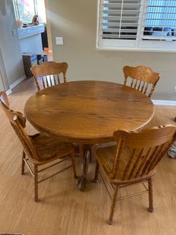 Wood dining table with leaf and 4 chairs