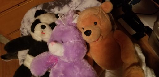 3 stuffed animals .. Easter bunny, panda bear and winnie the pooh