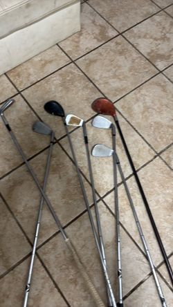 Speakers boxes and golf clubs