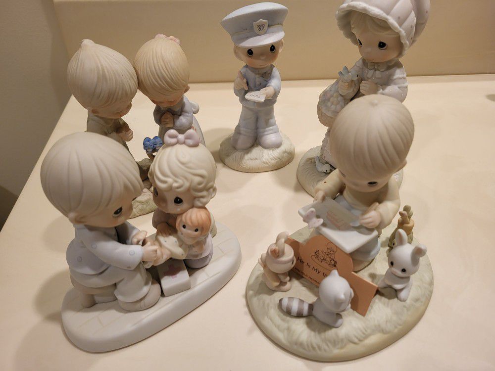 A wonderful set of five Precious Moments figurines for $50