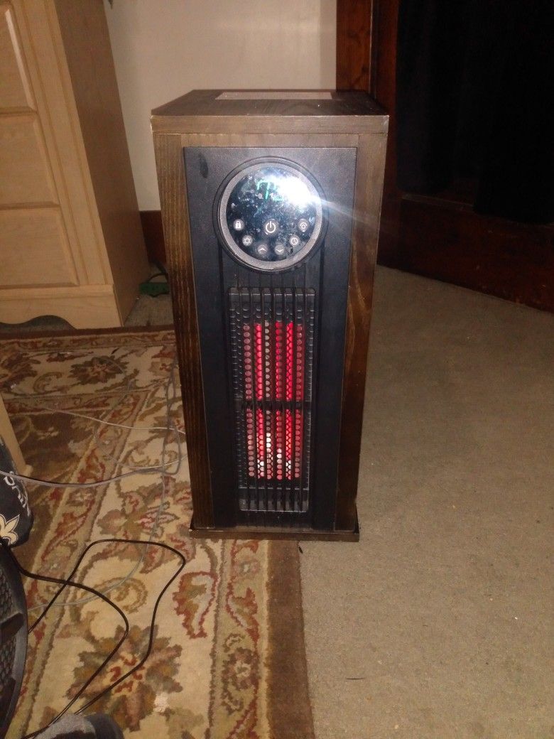 A High Efficient Heater With A Thermostat Built In In A Fan Rotating