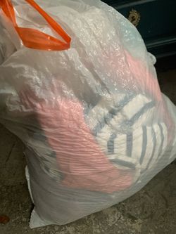 Trash bag full juniors clothes