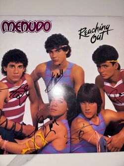Menudo signed album, “Reaching Out”.  All 5 members signed.