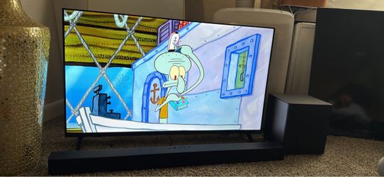 40" Smart TV with Soundbar and Subwoofer.