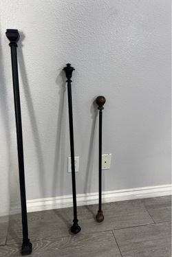 One Shower rod and two two curtain rods
