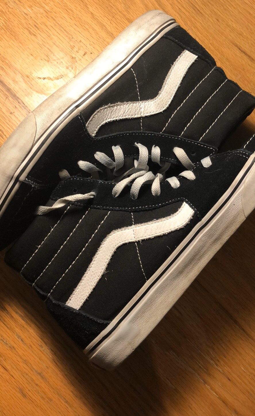 Men’s black Vans high tops