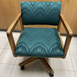 Green Brocade Upholstered Rolling Oak Chair