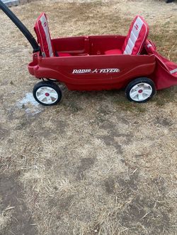 Kids plastic Radio Flyer 2- seat wagon