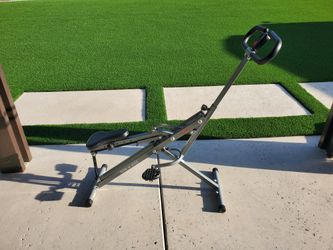 Sunny Health & Fitness Squat Assist Row-N-Ride Machine