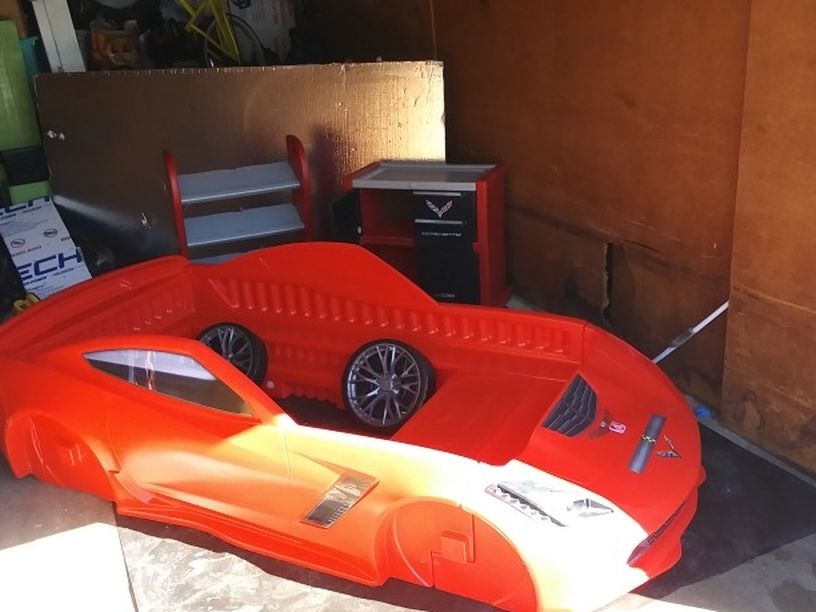 Corvette Bed Frame Complete With Wheels And Dresser Cubby Holes For Toys