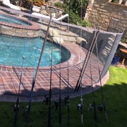 EIGHT (8) Fishing Rods with Reels ( Three Reels are Shimano).
