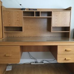 Desk with glass top 60” L,30” W, 29” H. And a Hutch 60” L,27” H,12” W
