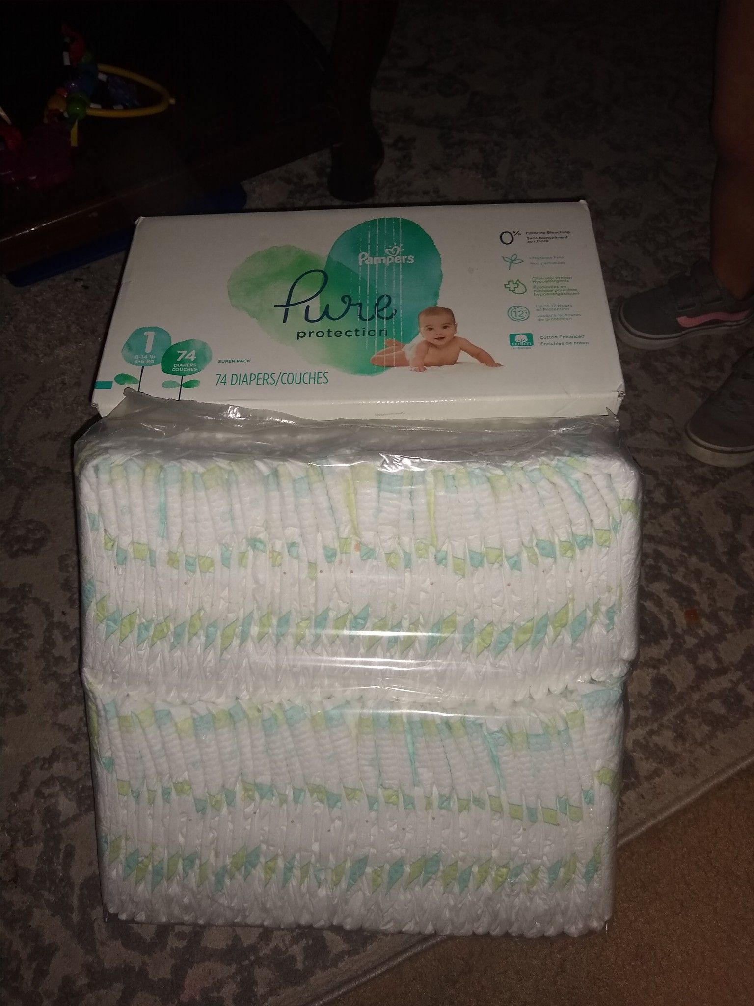Un-opened diapers . One in bag are Costco brand, and un-opened Pampers. 10$