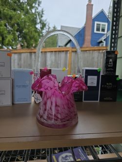 Pink, ruffled, hand blown basket
