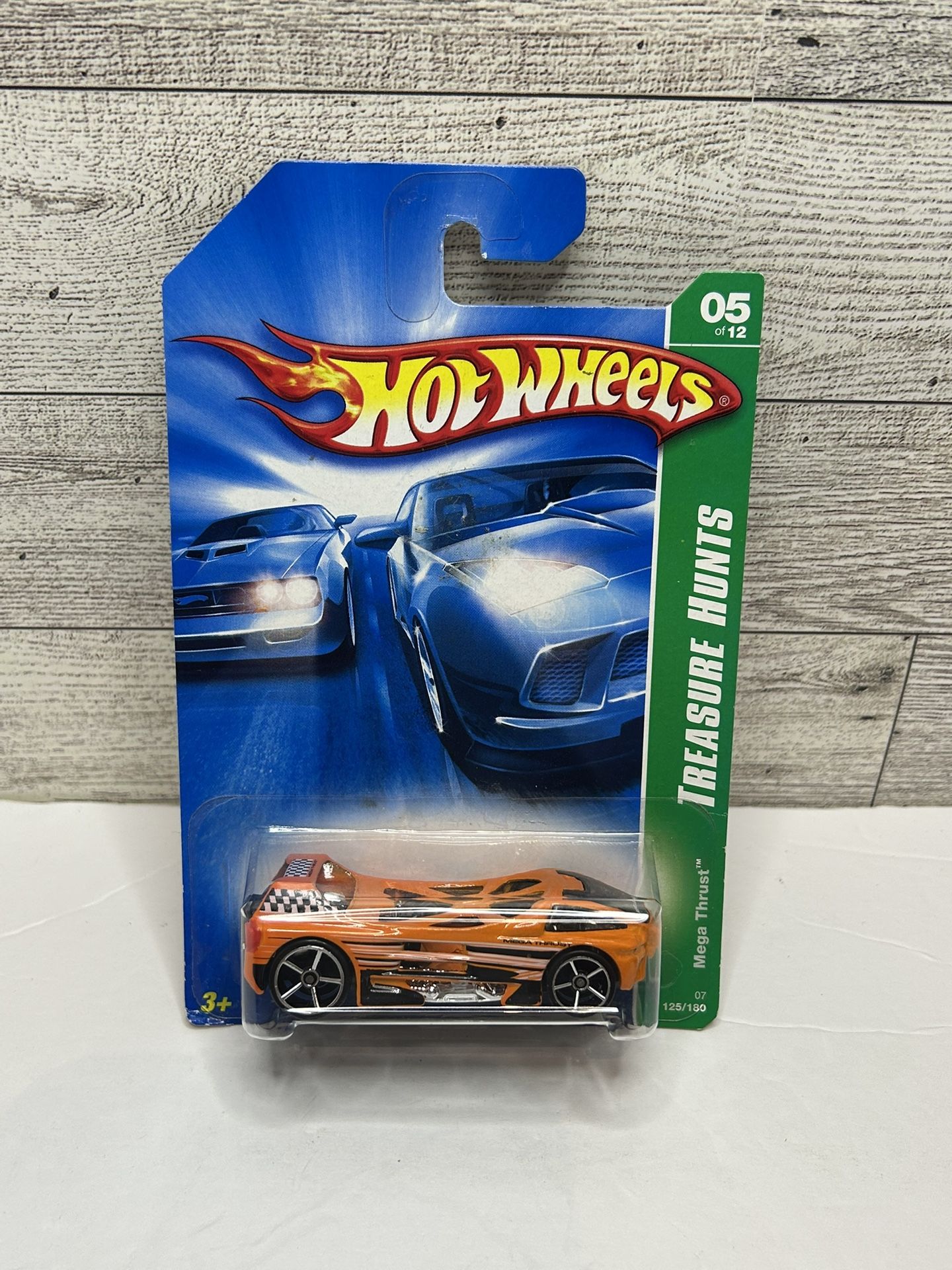 Hot Wheels Orange ‘2006 Mega Thrust / Treasures Hunts • Die Cast Metal • Made in Malaysia