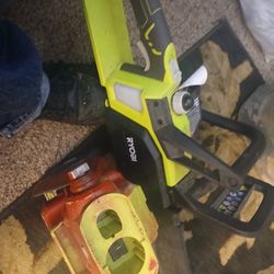 Ryobi Chainsaw And Floodlight