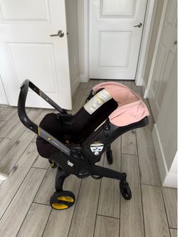 Doona baby stroller pink
