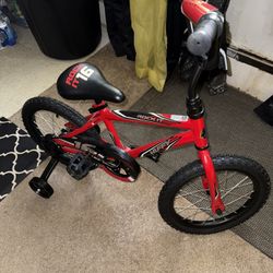 Kids brand new rock it bike with training wheels