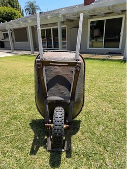 Larger wheel barrel/mixer  in good working order