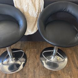 2 swivel & adjustable height Barstools