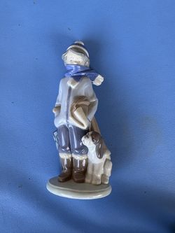 Lladro boy with dog