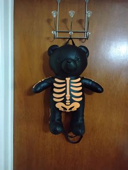 Skeleton Teddy Bear Backpack. Glows in the dark