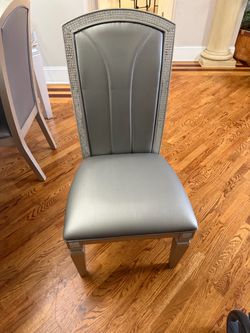 Silver dining room table with diamond trim