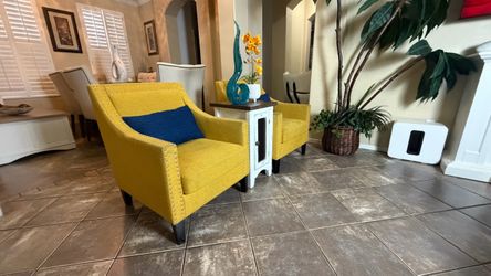 Beautiful set of two nailhead trim arm accent chairs ( color yellow )