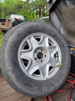 (4) 235 70 R16 tires on aluminum wheels