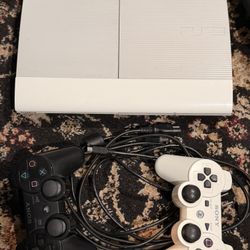 PS3 Console With Two Controllers And Several Games