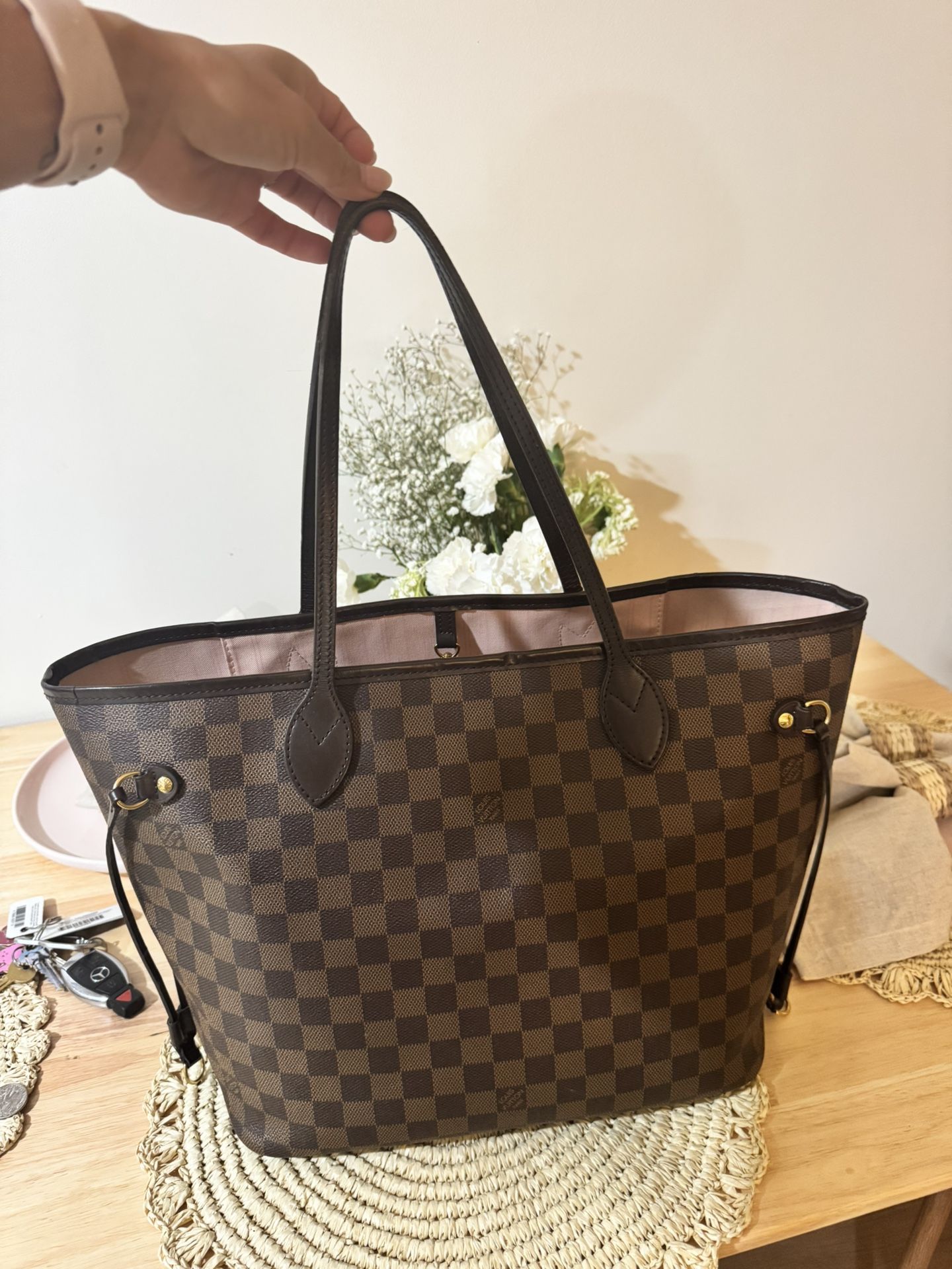 Louis Vuitton Neverfull MM in the Damier Ebene canvas with the Rose Ballerine pink interior