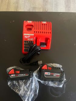 Milwaukee M18 baterías nuevas y cargador nuevo $100 firme precio