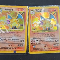 2 Un Base Set Charizards 1 Un Team Rocket Pokémon  