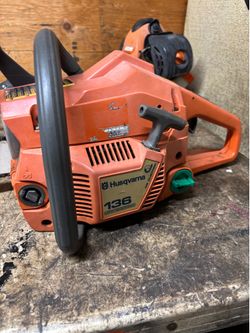 Husqvarna 136 strong chainsaw.