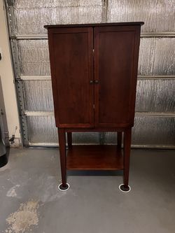 Dark Wood Cabinet with Shelves