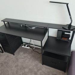 Computer table with multiple shelves and 3 drawers