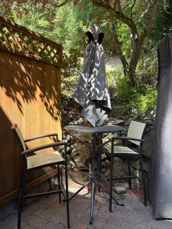 Free Tall Table, 2 Chairs, And Umbrella