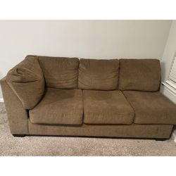 Brown 3 seated couch