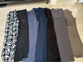 7- Pairs Men’s Quality Pants Size Medium, Clean Like New