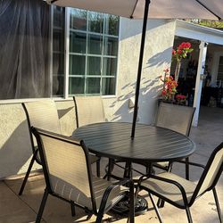 Mesa de patio con 5 sillas