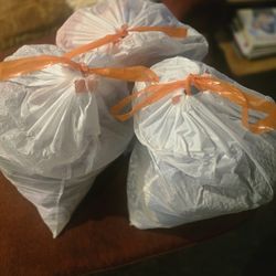 BAGS OF CLOTHES AND BOX OF SHOES 