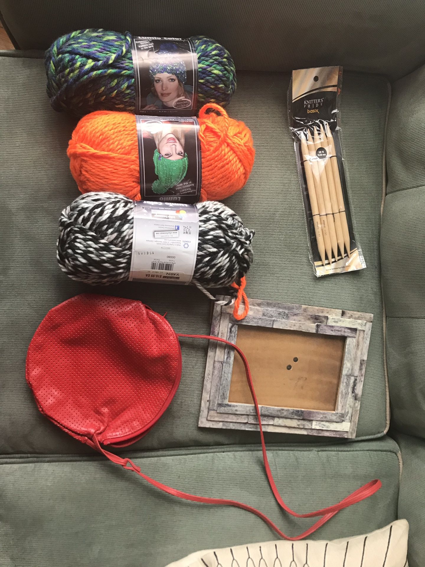 Free yarn and needles, picture frame, and red bag