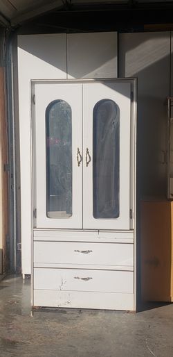 White and gold armoire