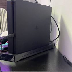 Sony PlayStation 4 Slim Console 1-TB Hard Drive Like New, Perfect Condition, Used A Few Times, No Dent Or Scratches, Stand Included.