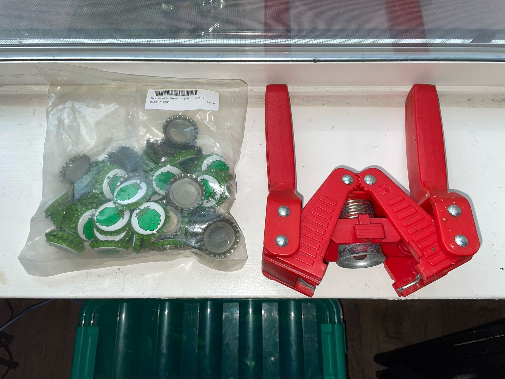 Bottle Capper And New Bag Of Bottle Caps