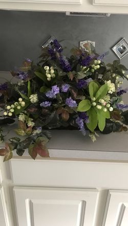 Floral Arrangement in Dark wicker basket