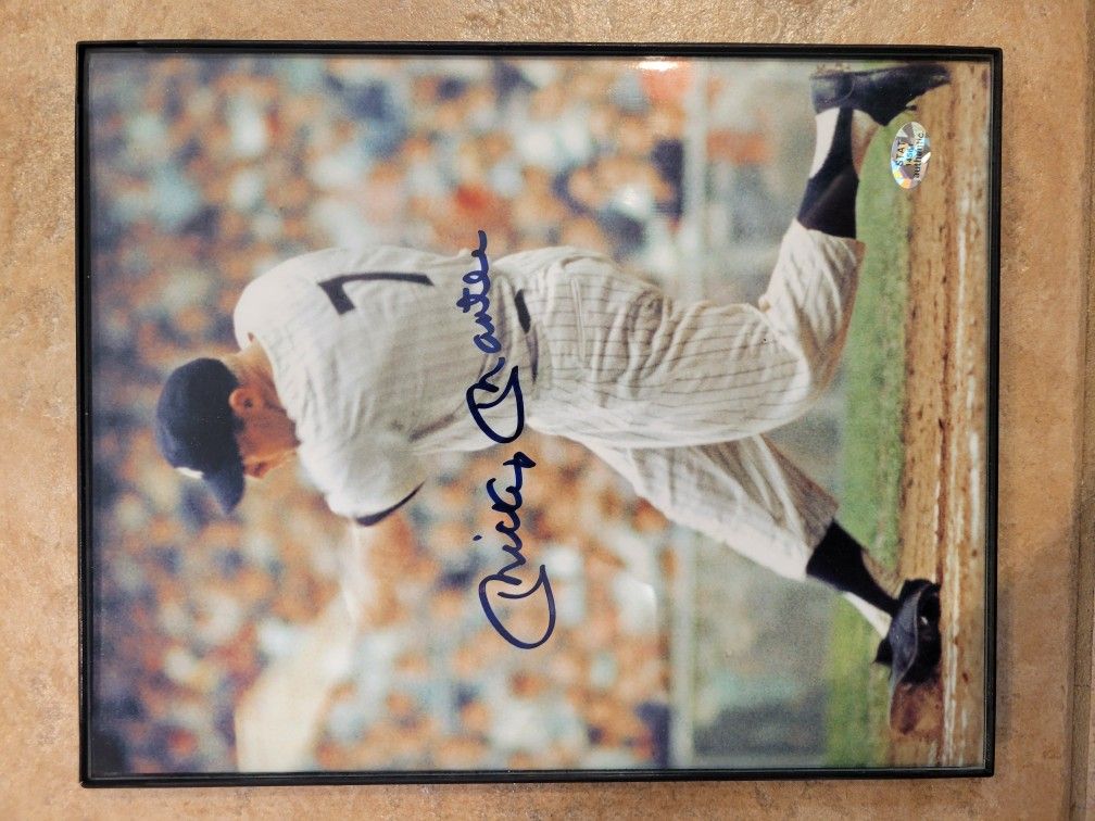 Autographed Mickey Mantle, Ted Williams, and Sandy Koufax pictures with Authentication stamp on photos.