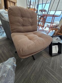 Brown Corduroy Tufted Swivel Chair