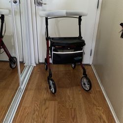 Brand new Runner 4 Wheel Walker Red