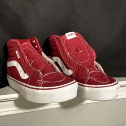 Red women’s high-top platform Vans  